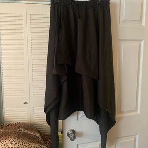 BLACK HAREM PANTS WITH FLAPS.